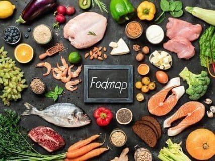 Fodmap on backboard surrounded by food